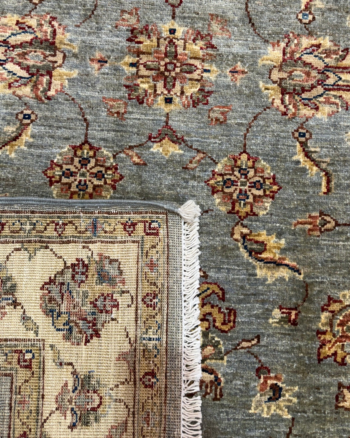 Tappeto Choobi 146x101 cm azzurro con bordura crema e motivi floreali