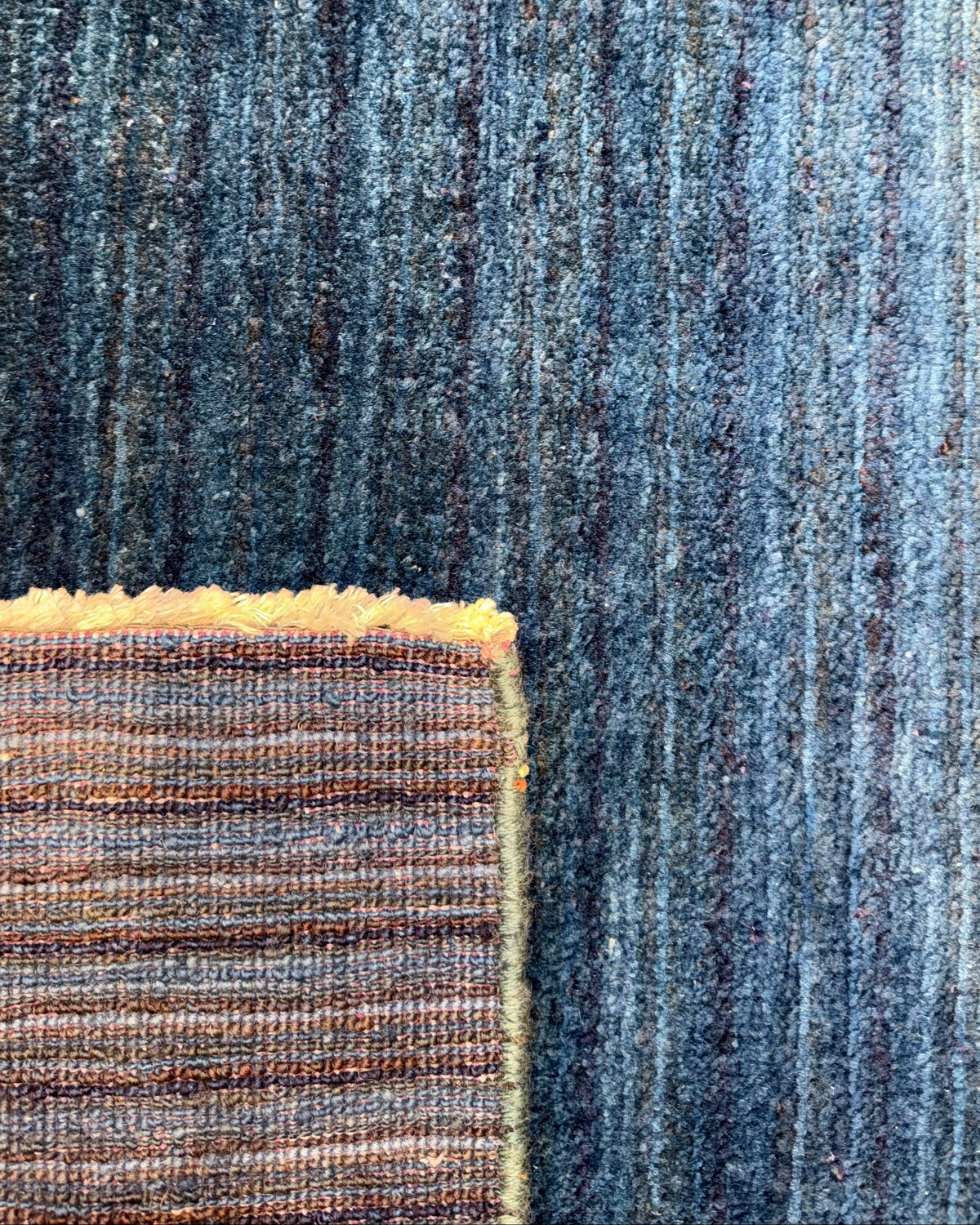 Tappeto persiano Gabbeh 130x80 cm blu con variazioni cromatiche