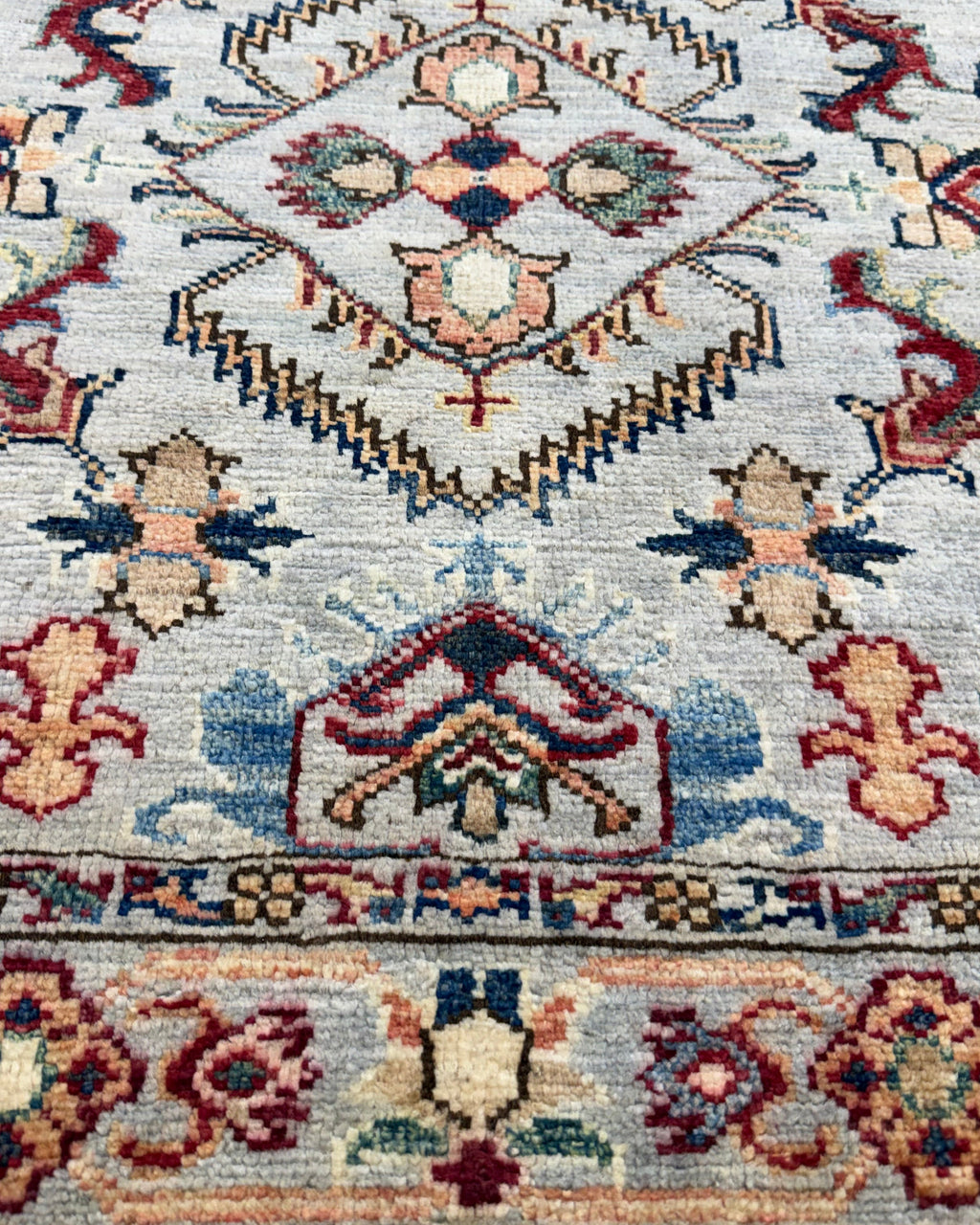 Tappeto Kazak 151x90 cm azzurro con medaglioni geometrici policromi
