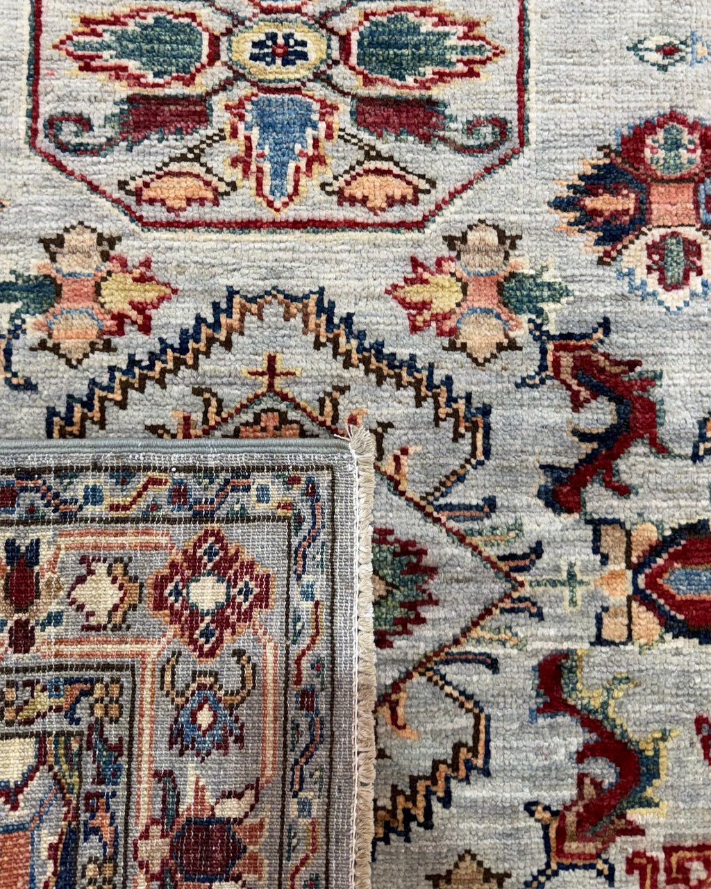 Tappeto Kazak 151x90 cm azzurro con medaglioni geometrici policromi