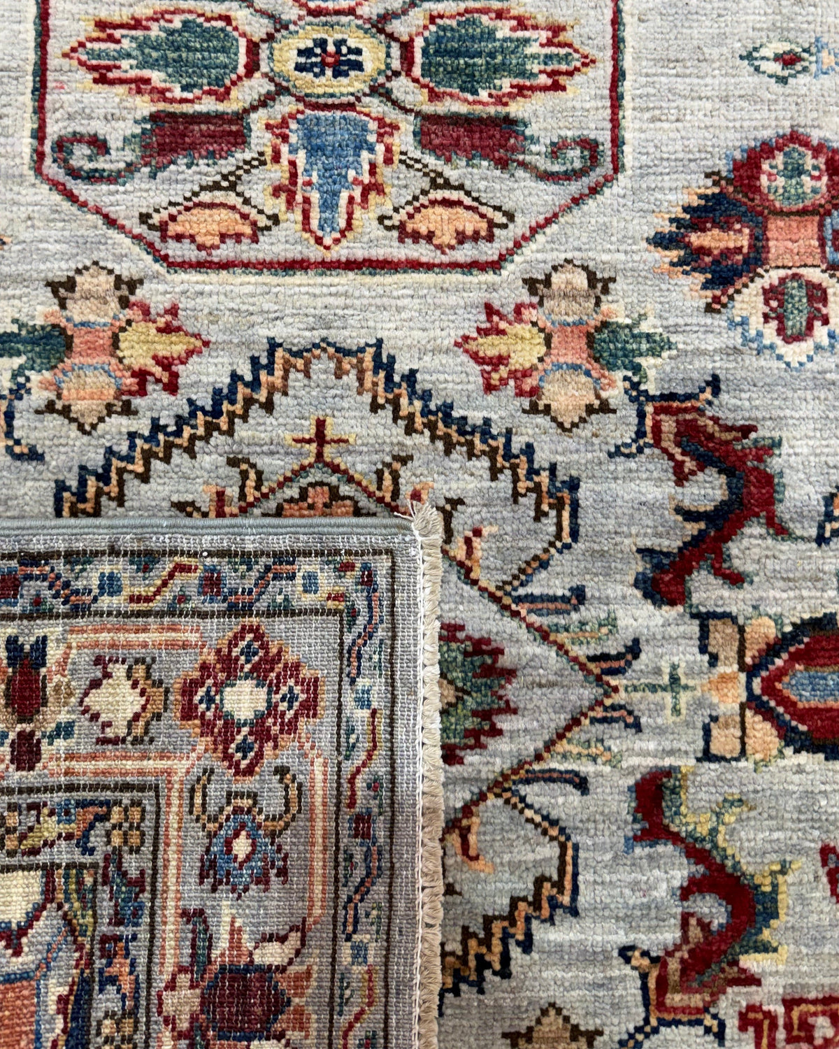 Tappeto Kazak 151x90 cm azzurro con medaglioni geometrici policromi