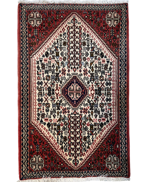 Abadeh 103x66 cm - scendiletto persiano annodato a mano con motivi geometrici rossi e avorio