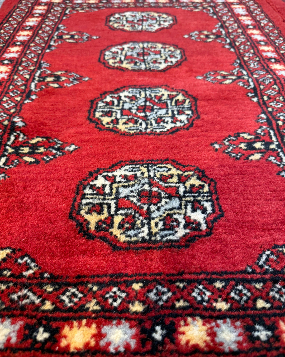 Kashmir 90x60 cm, coppia di scendiletto rossi con medaglioni geometrici