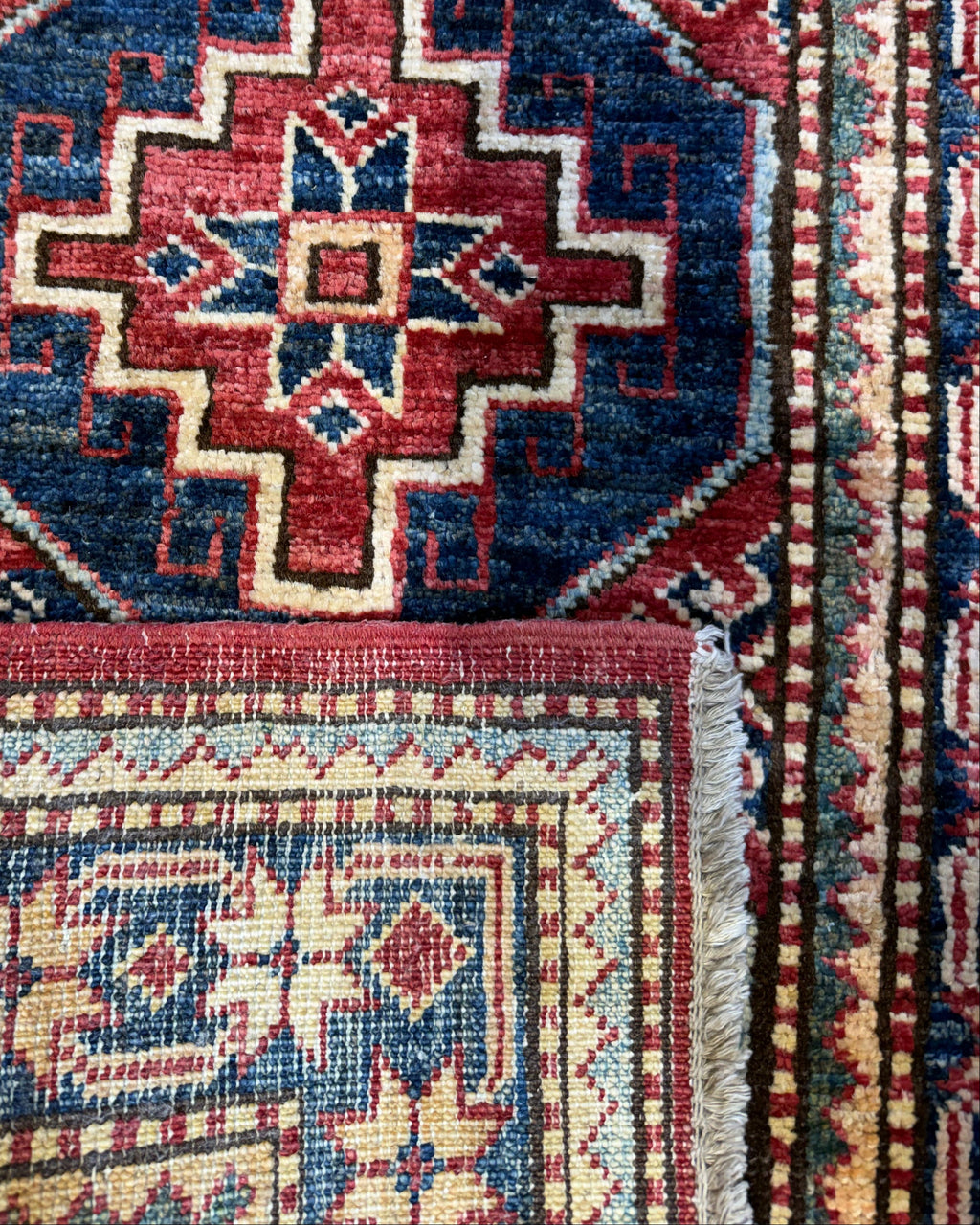 Kazak 96x57 cm - coppia di scendiletto annodati a mano con medaglioni geometrici