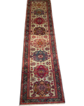Passatoia azera usata 306x80 cm con medaglioni geometrici policromi su fondo avorio