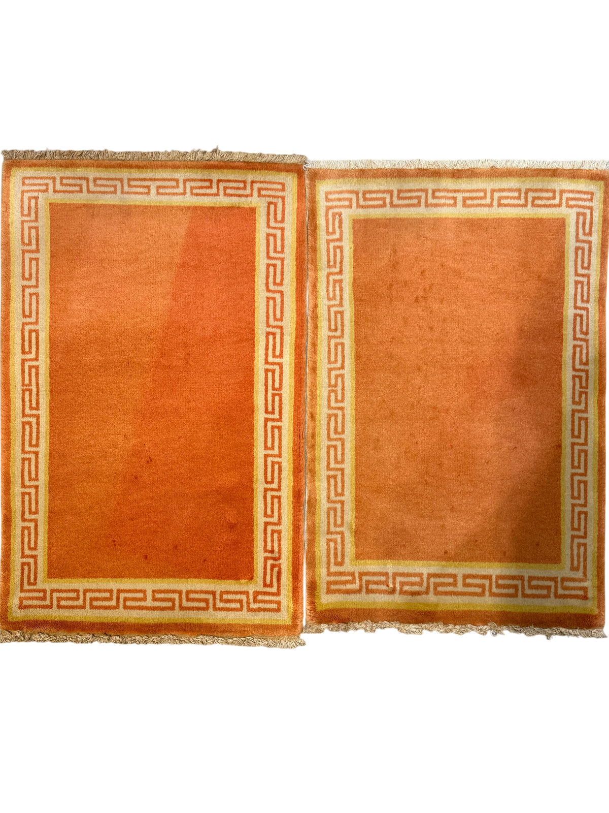 Pechino 92x61 cm - coppia di scendiletto annodati a mano con fondo arancio e bordura geometrica