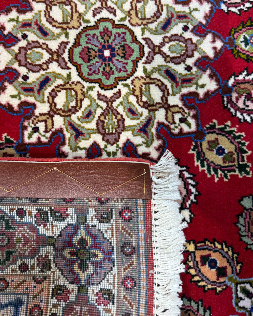 Tappeto persiano Tabriz 60 Raj 94x66 cm rosso con medaglione centrale