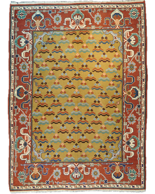 Tappeto Anatolia annodato a mano con campo avorio dorato e bordura decorativa nei toni del rosso terracotta e azzurro, misura 170x120 cm