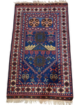 Tappeto Anatolia usato 120x74 cm in lana con fondo blu e motivi geometrici tradizionali