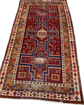 Tappeto Azero caucasico usato 245x135 cm in lana con medaglioni geometrici su fondo rosso