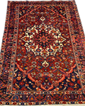 Tappeto Bakhtiari usato 255x155 cm persiano con medaglione centrale rosso blu e avorio