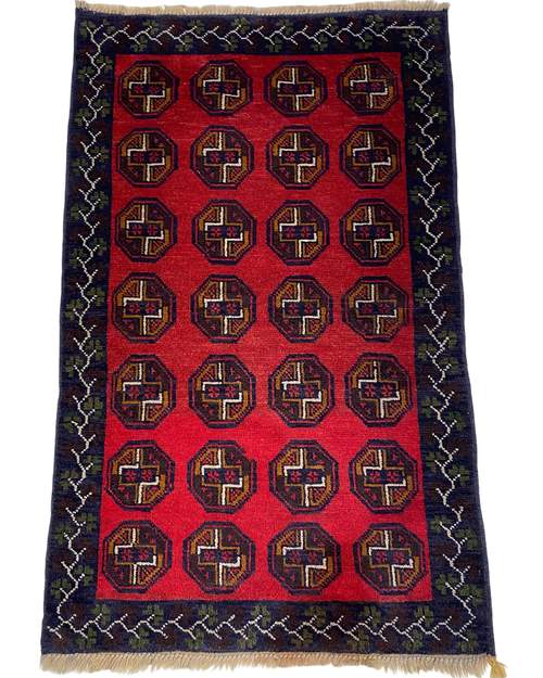 Beluch persiano usato 132x83 cm rosso con motivi geometrici tribali