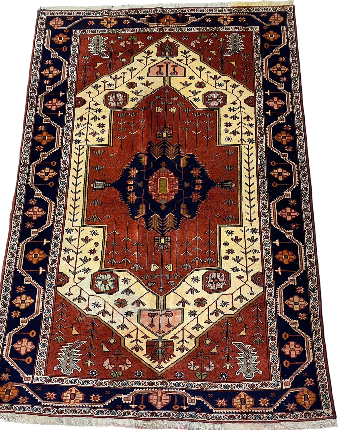 Tappeto Gucian Fine usato 186x131 cm annodato a mano con medaglione geometrico su fondo rosso