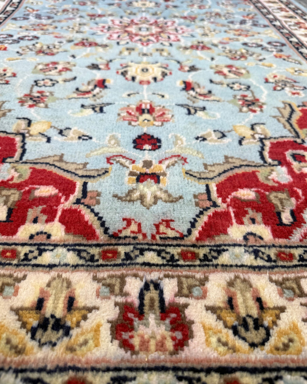 Tappeto Islamabad azzurro 125x78 cm con motivi floreali