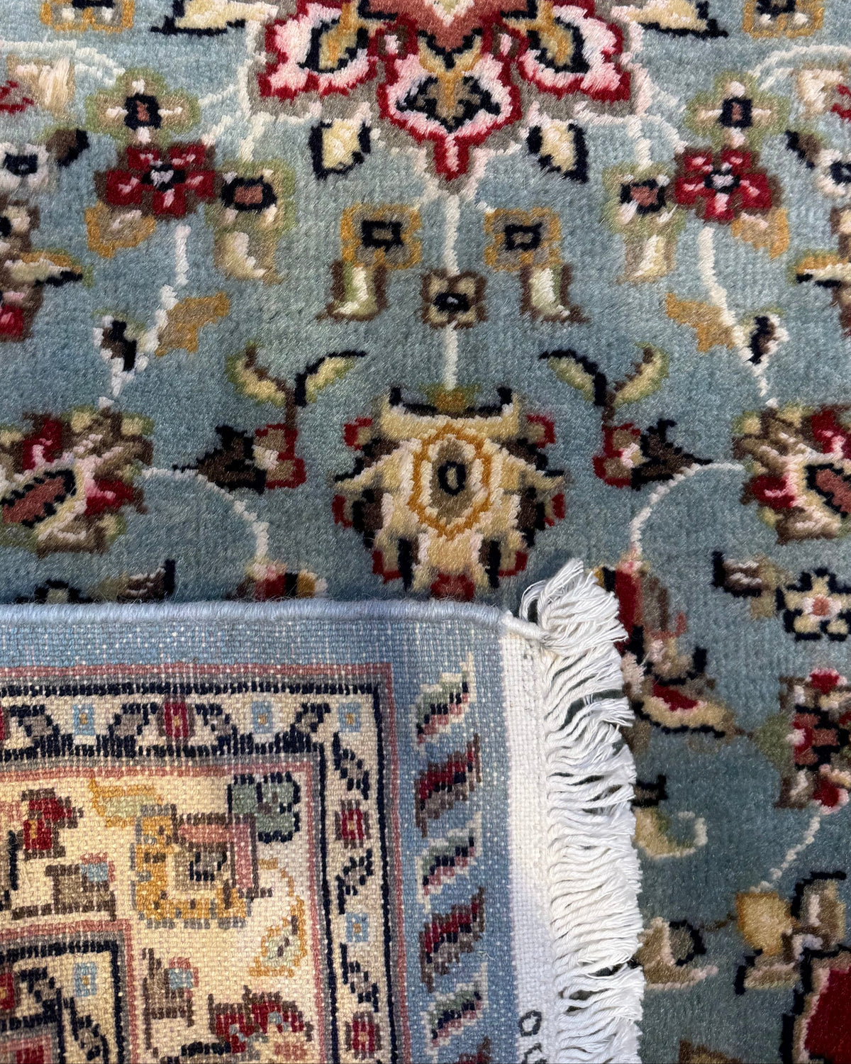 Tappeto Islamabad azzurro 125x78 cm con motivi floreali