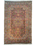 Tappeto Kerman persiano annodato a mano con medaglione centrale floreale e bordura azzurra, misura 228x151 cm