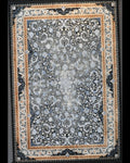 Tappeto meccanico con raffinati motivi floreali e medaglione centrale su fondo nero, misura 150x100 cm