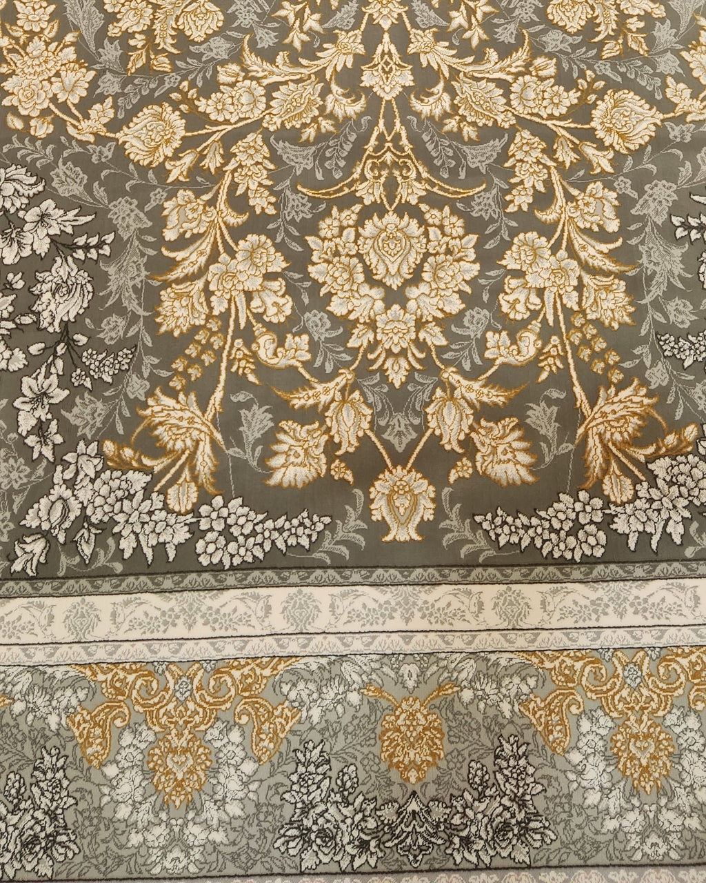 Tappeto meccanico con elegante medaglione centrale e raffinati motivi floreali su fondo grigio antracite, misura 225x150 cm