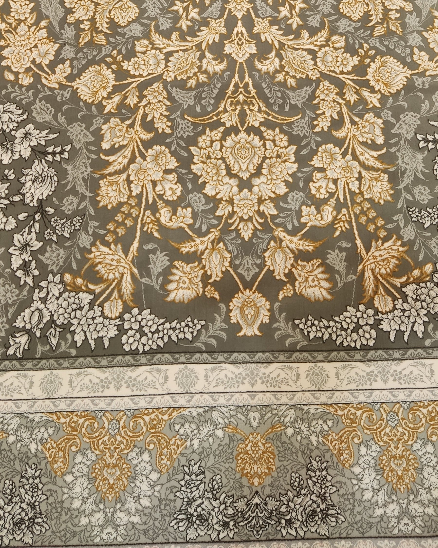 Tappeto meccanico con elegante medaglione centrale e raffinati motivi floreali su fondo grigio antracite, misura 225x150 cm