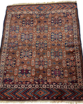 Tappeto russo antico usato 130x110 cm annodato a mano con motivi geometrici policromi