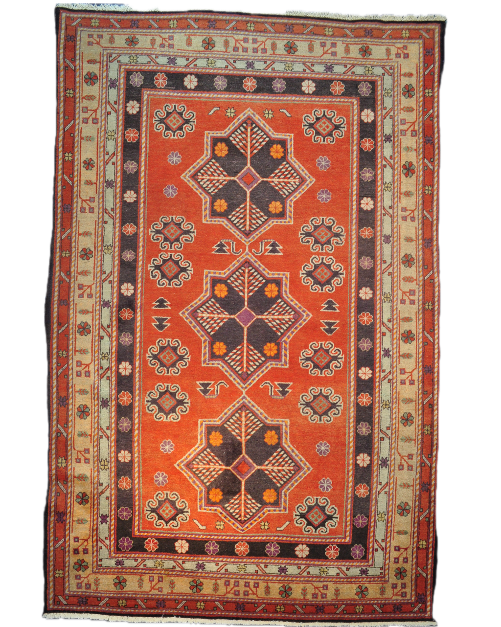 Tappeto Samarkanda annodato a mano con fondo terracotta e grandi motivi geometrici ispirati alla Via della Seta, misura 255x160 cm