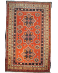 Tappeto Samarkanda annodato a mano con fondo terracotta e grandi motivi geometrici ispirati alla Via della Seta, misura 255x160 cm