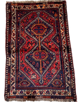 Tappeto persiano Shiraz usato 120x80 cm annodato a mano con disegno geometrico tribale su fondo rosso
