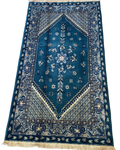 Tappeto tunisino usato 220x120 cm blu petrolio con decori floreali e bordura avorio