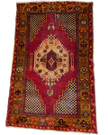 Tappeto turco usato 160x105 cm rosso con medaglione geometrico e bordura decorata